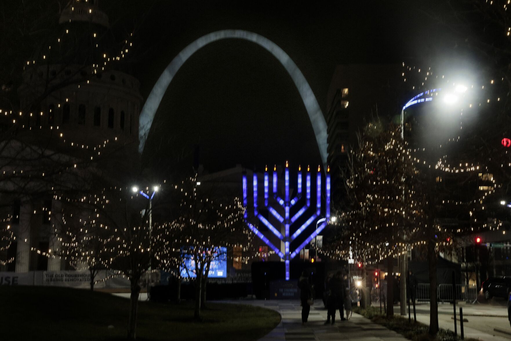 About two dozen people attend Night 6 of Chanukah Menorah Lighting